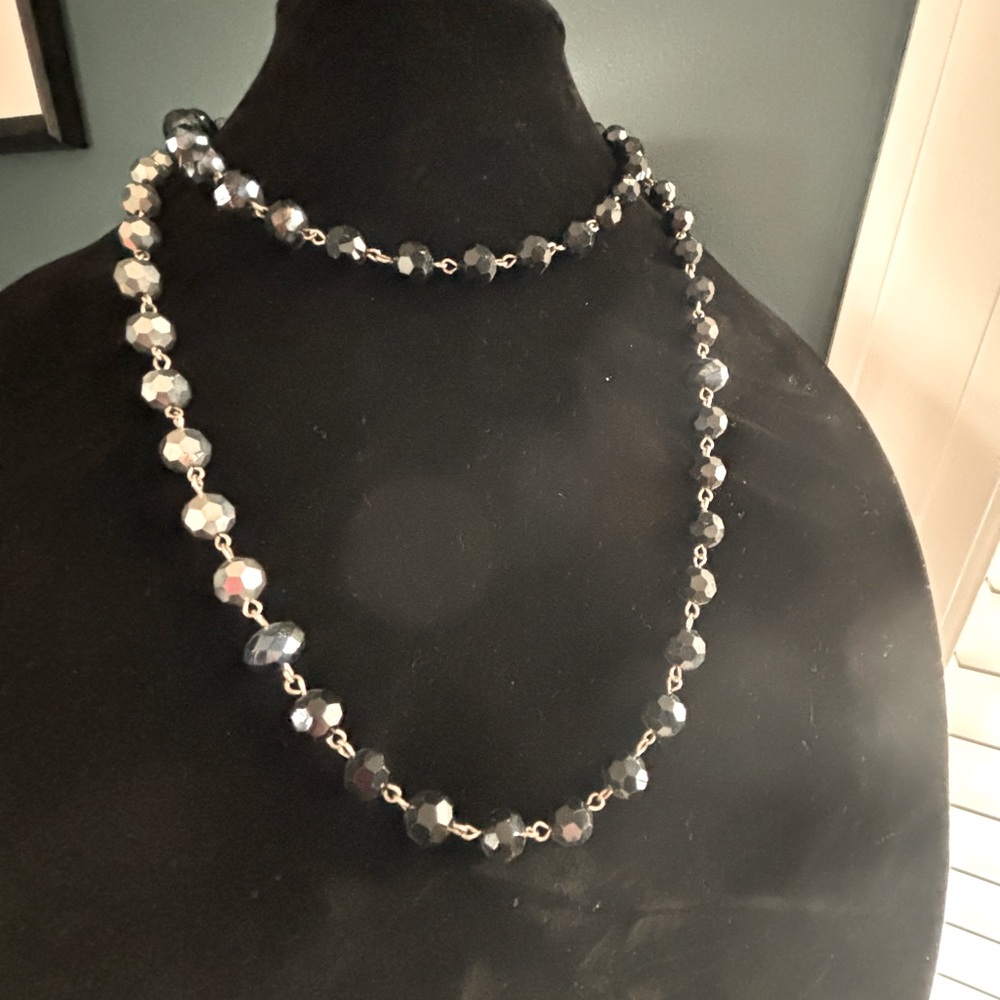 Long glass contrasting silver and black beads